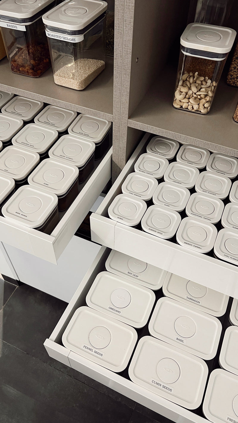 Kitchen storage solution with labeled containers on shelves and drawers. - Casa Eva | Home Organizing and Styling